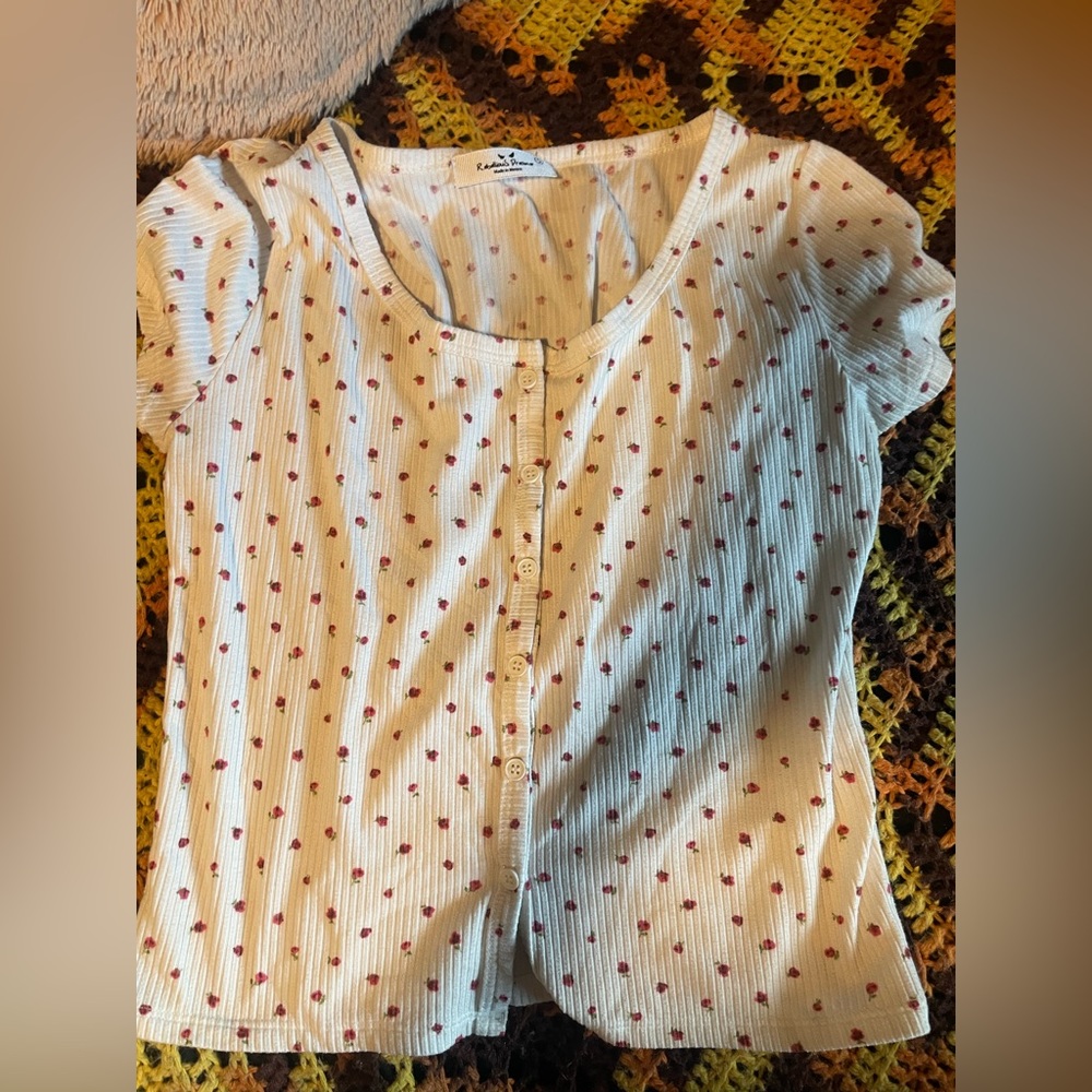 White button down shirt with red flowers on it